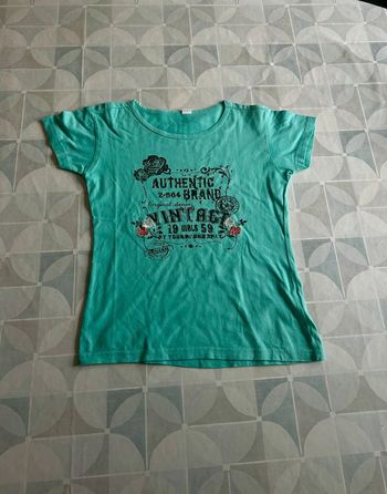 T shirt fille - 12 ans - en très bon état