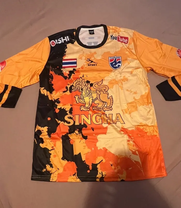 🟠 Maillot Thaïlandais 🇹🇭 SINGHA – orange / manches longues – Taille M – neuf sous blister