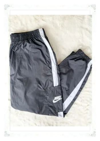 Jogging Nike imperméable – Noir et blanc – Taille S (étiquette L) Homme