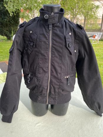 Blouson noir Teddy smith taille 8 ans