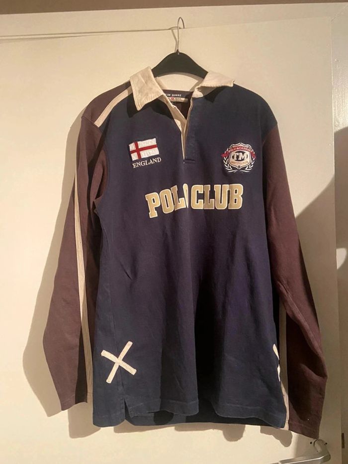 Polo longue mange avec logo dans le dos