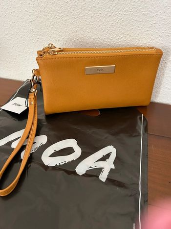 Porte feuille avec anse