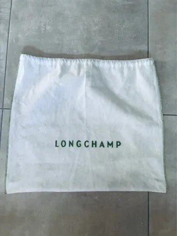 Grand dust bag Longchamp pour protéger sac neuf