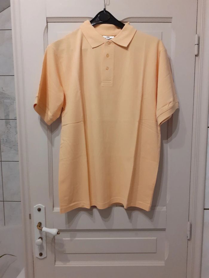 Polo  taille 4 neuf