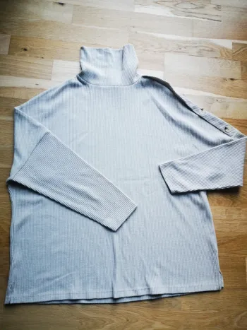 Pull col roulé