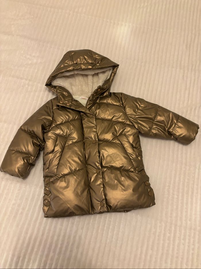 Magnifique doudoune doré