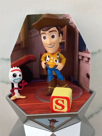 Figurine capsule Disney série 1 Woody Toy story