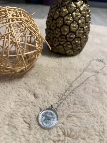Collier Harry Potter emblème poudlard neuf