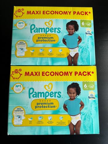 140 couches pampers premuim taille 6 