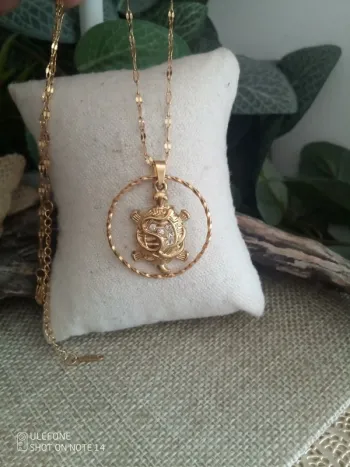 Collier tortue acier doré avec zirconium