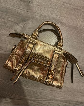 Sac à main doré neuf