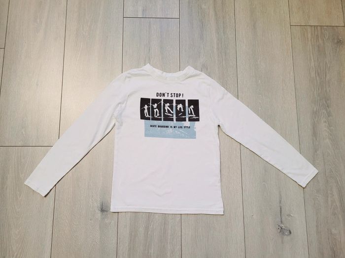 Maillot manche longue blanc. Garçon 8 ans. Marque Kiabi
