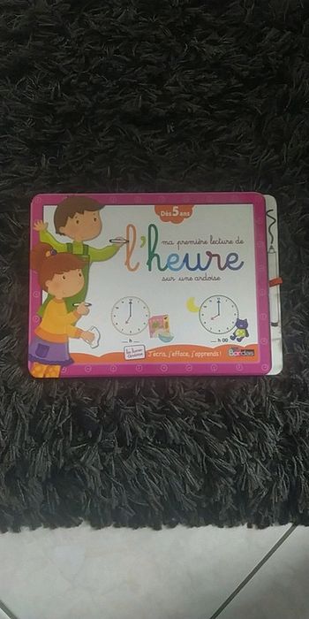 Ma première lecture de l'heure sur une ardoise