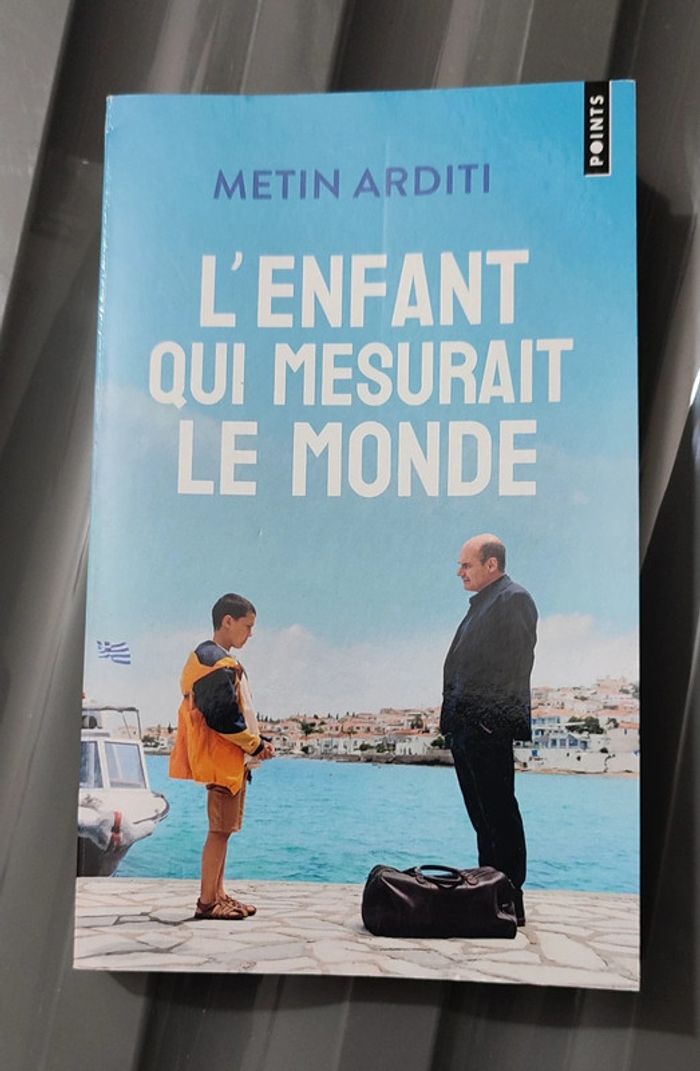 Livre l' enfant qui mesurait le monde