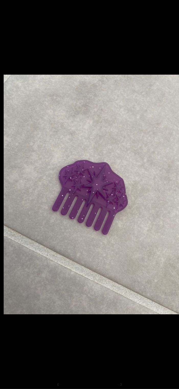 Jouet petit peigne poupée