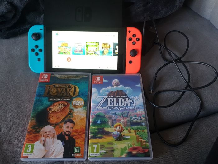 Console nintendo Switch plus jeux - photo numéro 3