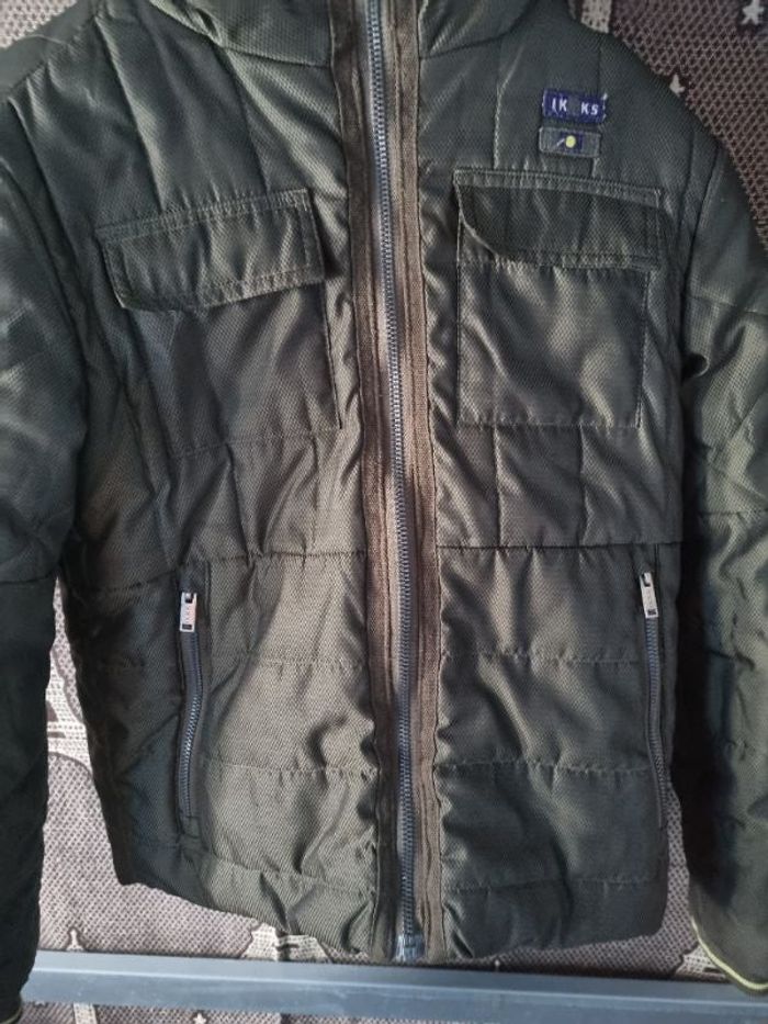 Veste doudoune à capuche intérieur fourré et imperméable 10ans