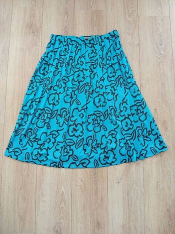 Jupe plissée turquoise à fleurs noires t40/42