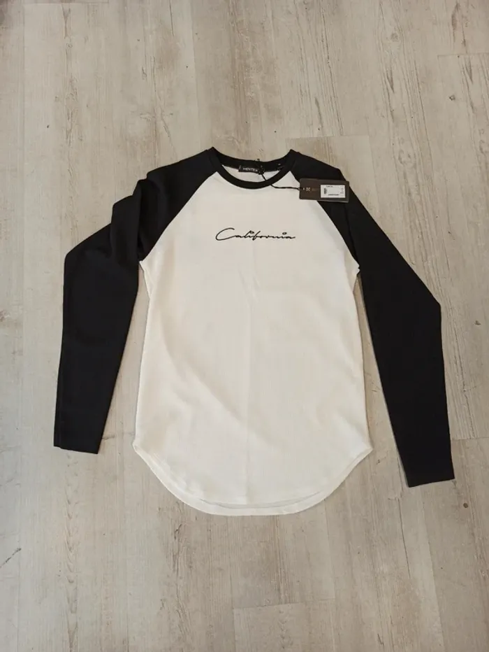 Pull fin homme blanc et noir taille XL