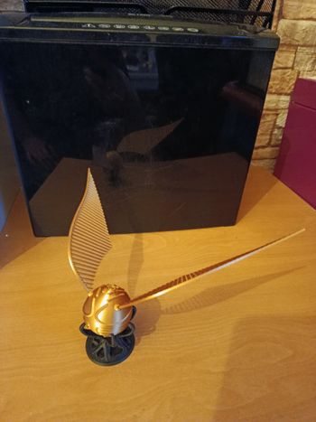 A saisir , NEUF , jamais utilisé , magnifique vif d'or " HARRY POTTER "