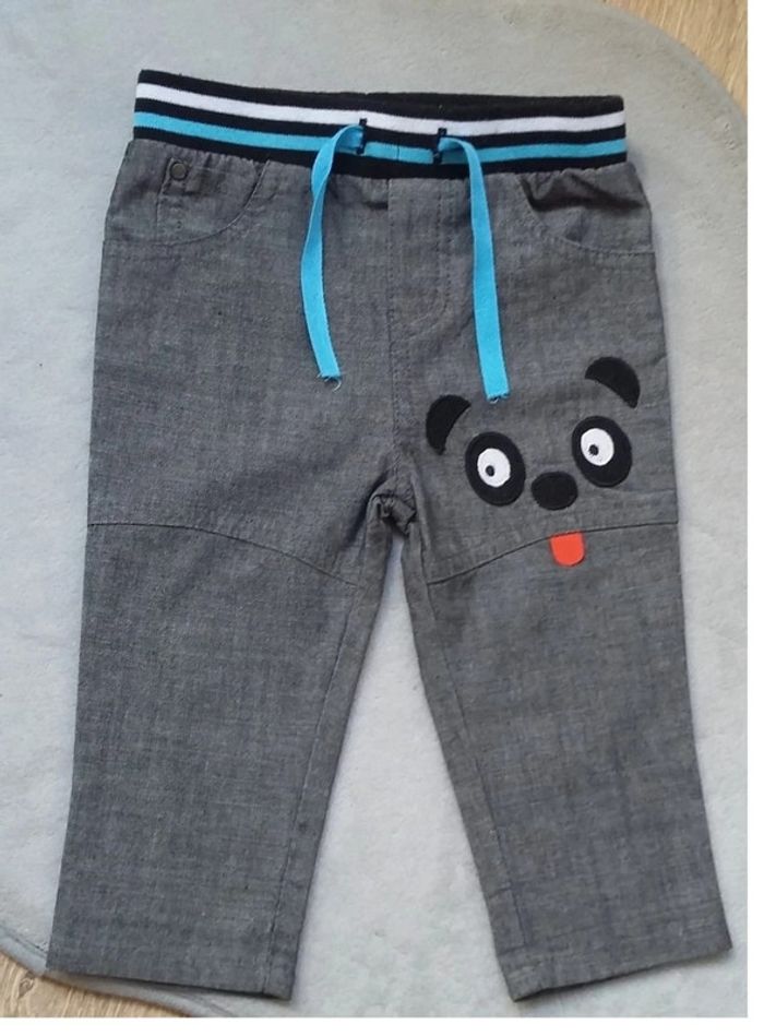pantalon orchestra motif "chien" 6 mois en très bon état