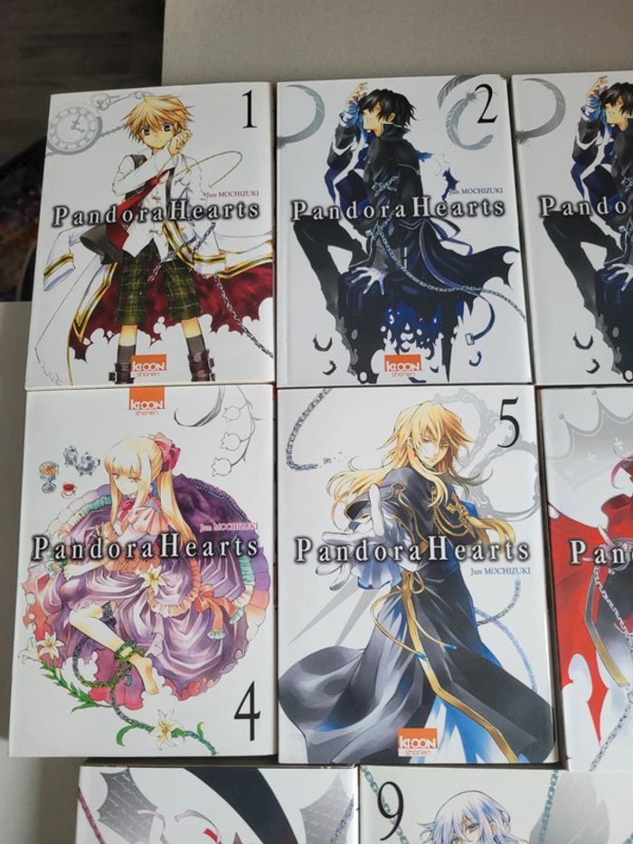 Lot 11 tomes du manga pandor hearts - photo numéro 3