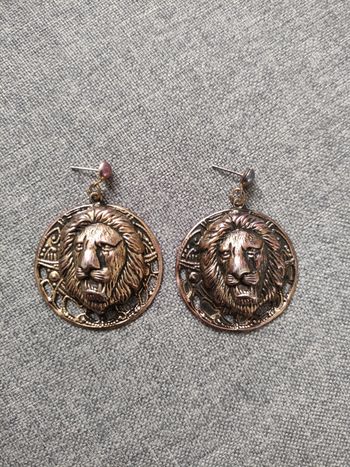 Paire de boucles d'oreilles lion