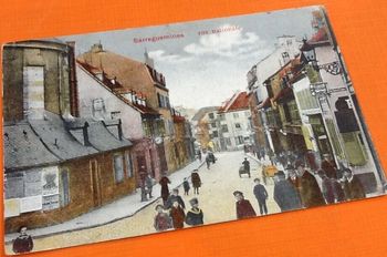 Carte postale ancienne Sarreguemines (Moselle) Rue Nationale