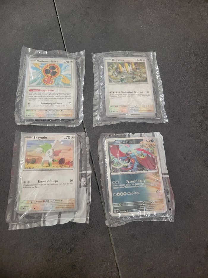 Lot 4 booster Pokémon prismatic