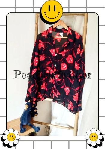 Chemisier noir transparent fleuri