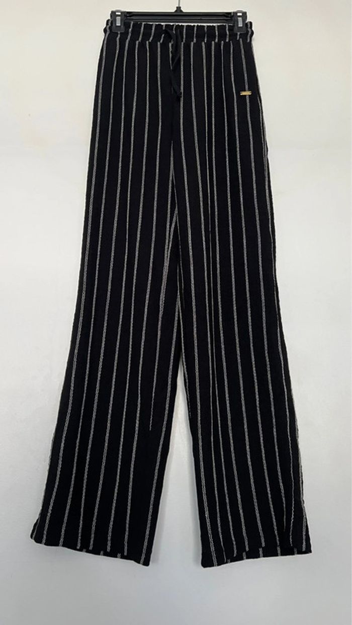 Pantalon fluide à jambes larges en parfait état taille S marque supertrash