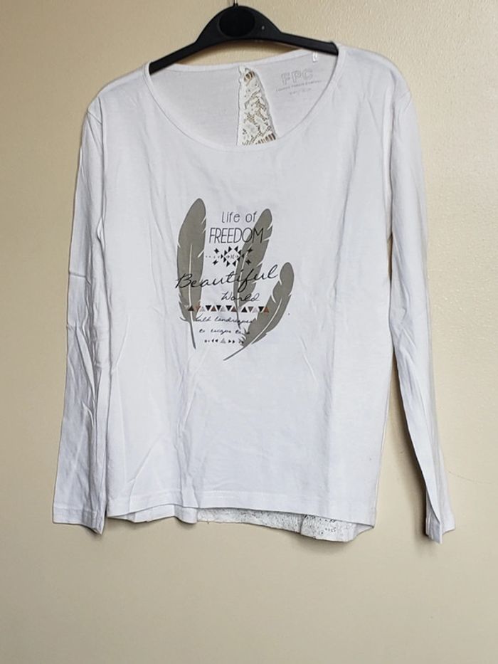 T-shirt manches longues avec dos ajouré taille 12 ans