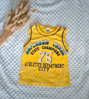 Tee-shirt sans manches 6 ans