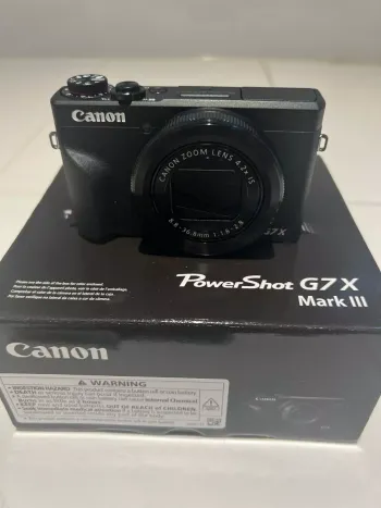 Canon PowerShot G7X Mark III Noir comme neuf avec accessoires et son carton d'origine sous garantie