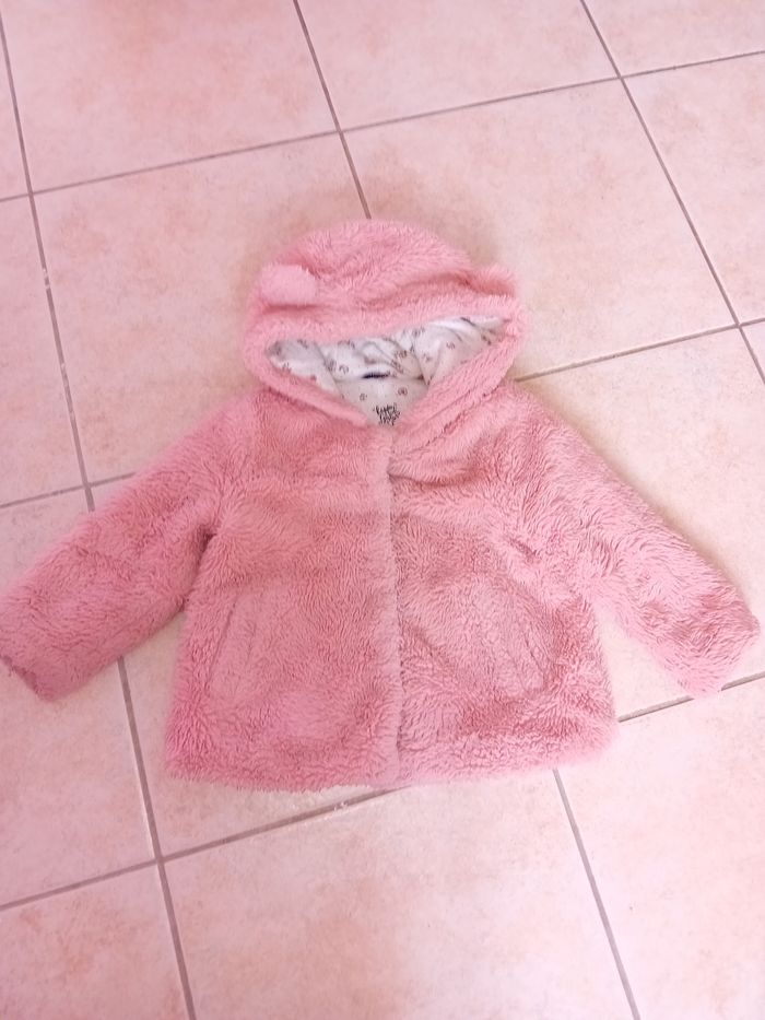 Manteau à fourrure rose