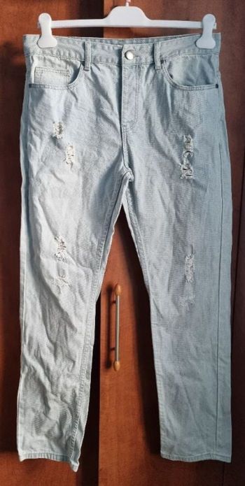 Jeans effet usé et troué taille 44 mixte