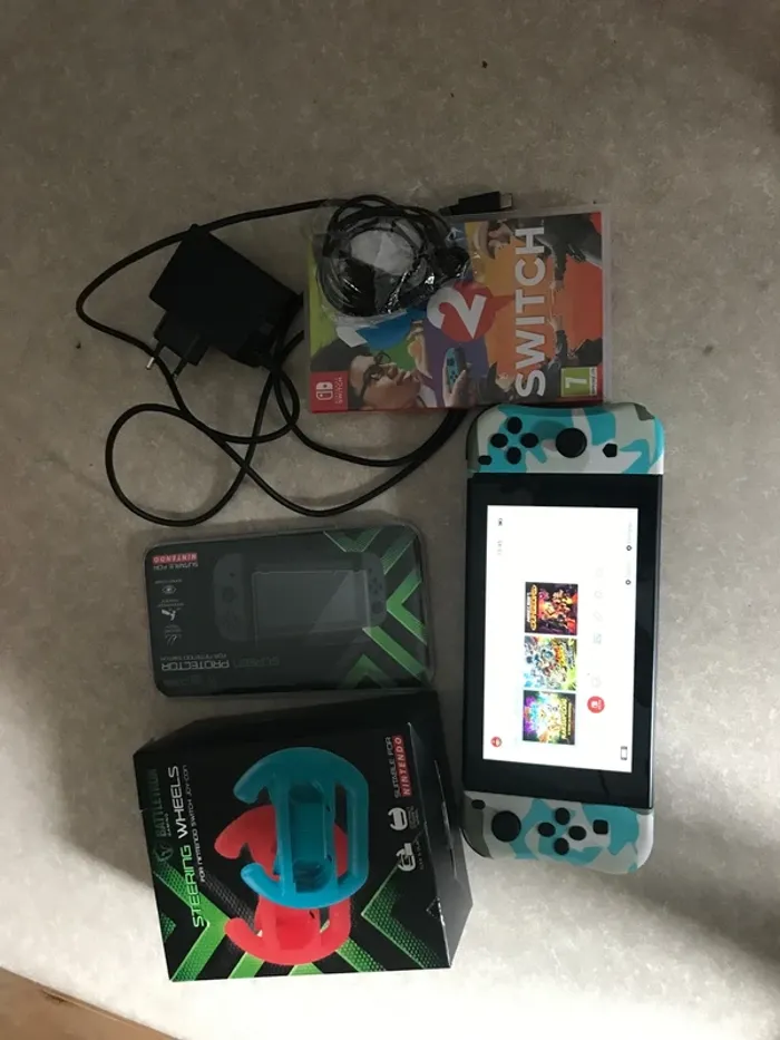 Nintendo switch avec accessoires - photo numéro 2