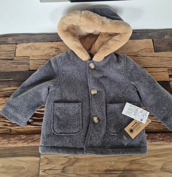Manteau neuf 12 mois