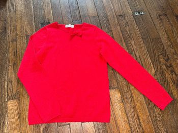 Pull H&M rouge brillant  10 ans