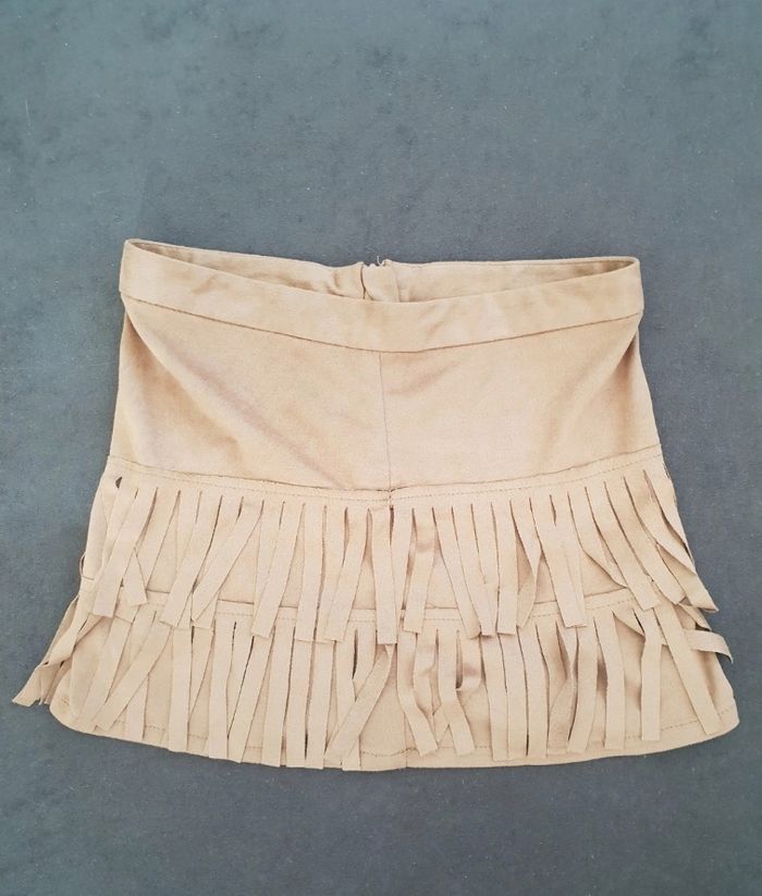 Jupe taille 5 ans en très bon état