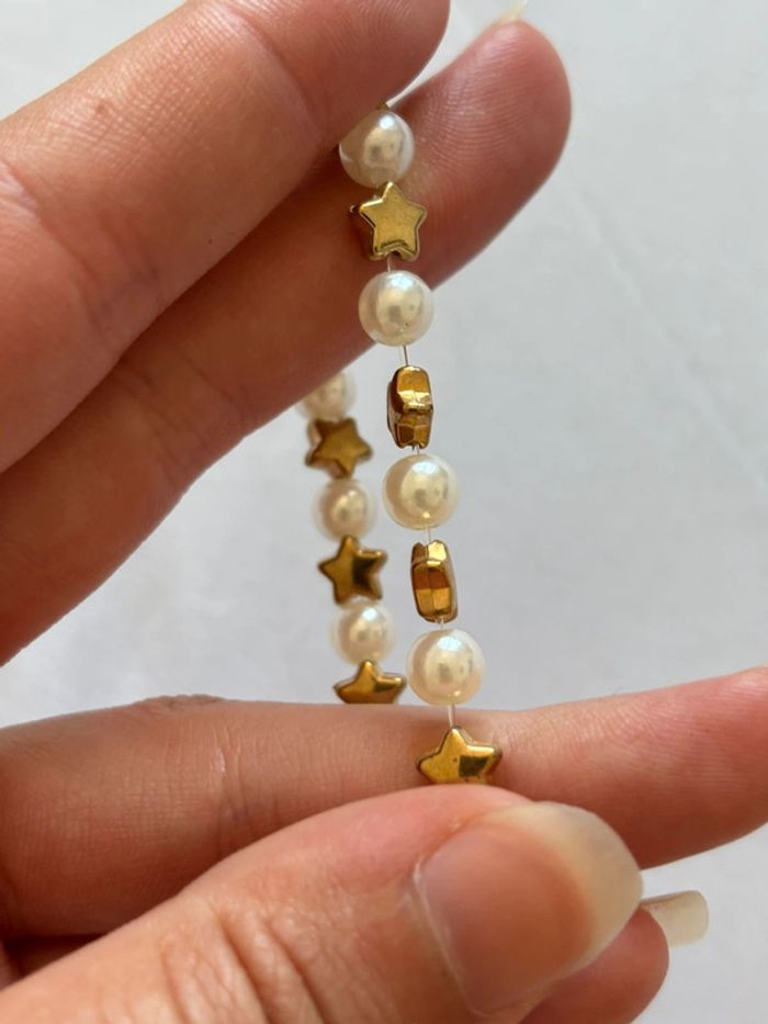 Bracelet élastique perles blanche et doré boule étoile fait main extensible - photo numéro 2