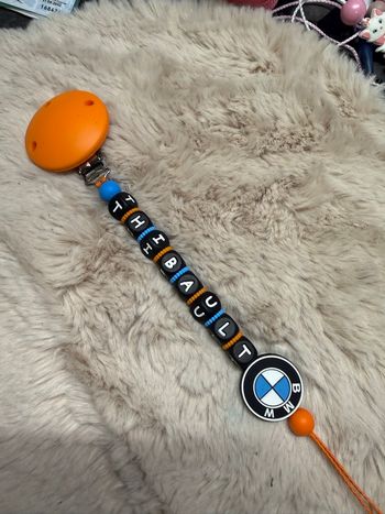 Attache tétine bmw