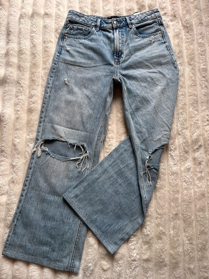 Jean troué bleu Stradivarius 38
