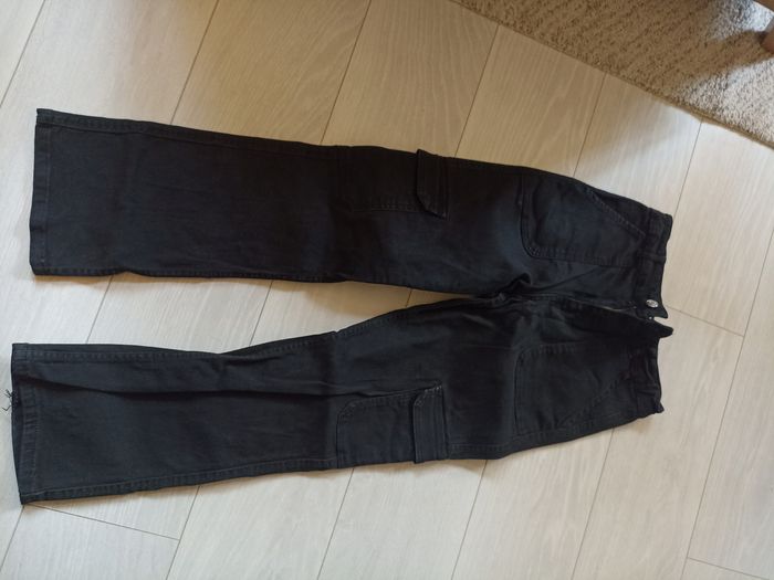 A vendre Jeans, cargo et jupe salopette, entre 9 et 13 ans a vendre - photo numéro 7