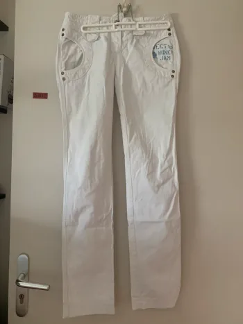 Pantalon en toile blanc.