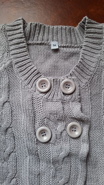 Gilet sans manche boutonné