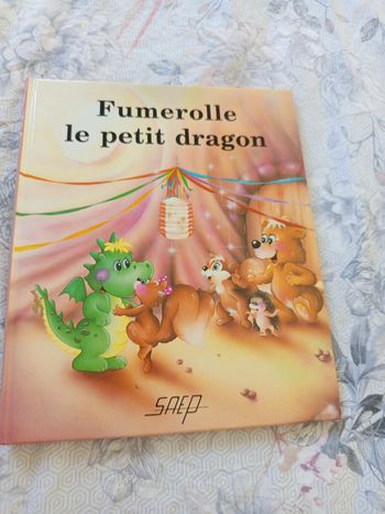 Livre fumerolle le petit dragon