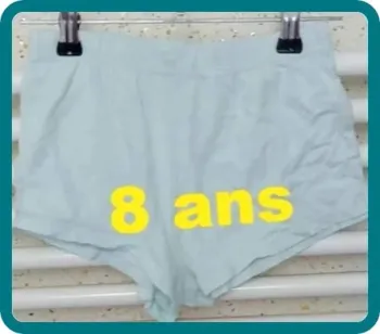Short  vert  eau Gémo  Taille  8  ans