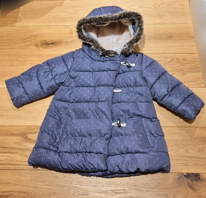 Manteau gris à pois