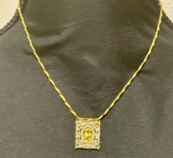 Collier habaha Paris tressé plaque xl relief jesus cristaux blancs